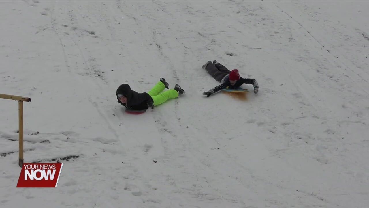 Winter weather challenges drivers but delights sledders